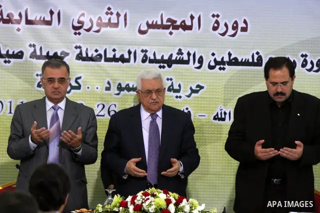 Palestinian Authority president and head of the Fatah movement Mahmud Abbas attends a Fatah "Revolutionary Council" meeting in the Palestinian West Bank city of Ramallah along with top officials on October 26, 2011, as t...