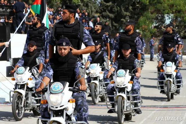 Hamas police officers demonstrate their skills during a ceremony in Gaza City in front of the media and Palestinian prisoners released in a recent swap between Hamas and Israel October 27, 2011. The Egyptian-brokered swa...