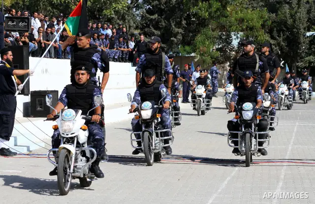 Hamas police officers demonstrate their skills during a ceremony in Gaza City in front of the media and Palestinian prisoners released in a recent swap between Hamas and Israel October 27, 2011. The Egyptian-brokered swa...
