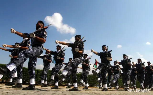 Hamas police officers demonstrate their skills during a ceremony in Gaza City in front of the media and Palestinian prisoners released in a recent swap between Hamas and Israel October 27, 2011. The Egyptian-brokered swa...
