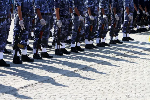Hamas police officers demonstrate their skills during a ceremony in Gaza City in front of the media and Palestinian prisoners released in a recent swap between Hamas and Israel October 27, 2011. The Egyptian-brokered swa...