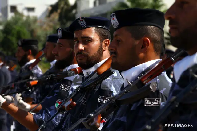 Hamas police officers demonstrate their skills during a ceremony in Gaza City in front of the media and Palestinian prisoners released in a recent swap between Hamas and Israel October 27, 2011. The Egyptian-brokered swa...