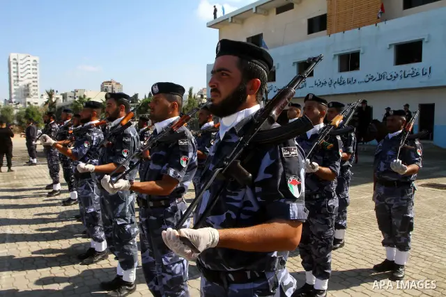 Hamas police officers demonstrate their skills during a ceremony in Gaza City in front of the media and Palestinian prisoners released in a recent swap between Hamas and Israel October 27, 2011. The Egyptian-brokered swa...