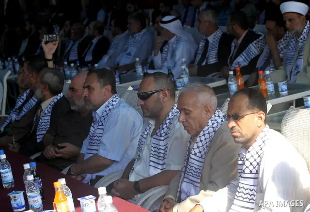 Palestinian prisoners, who released in a recent swap between Hamas and Israel, attend a celebration organised by Hamas movement in Gaza city on October 27, 2011. The Egyptian-brokered swap between Israel and Hamas Islami...