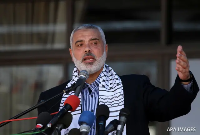 Palestinian prime minister in Gaza Strip, Ismail Haniya attends a celebration with prisoners, who released in a recent swap between Hamas and Israel, organised by Hamas movement in Gaza city on October 27, 2011. The Egyp...