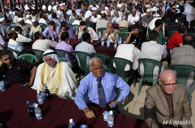 Palestinian prisoners, who released in a recent swap between Hamas and Israel, attend a celebration organised by Hamas movement in Gaza city on October 27, 2011. The Egyptian-brokered swap between Israel and Hamas Islami...