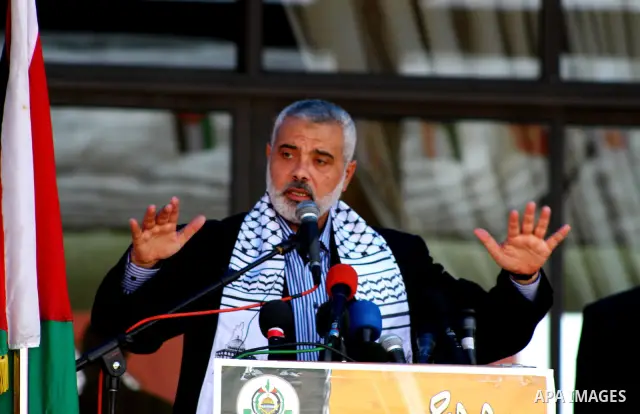 Palestinian prime minister in Gaza Strip, Ismail Haniya attends a celebration with prisoners, who released in a recent swap between Hamas and Israel, organised by Hamas movement in Gaza city on October 27, 2011. The Egyp...