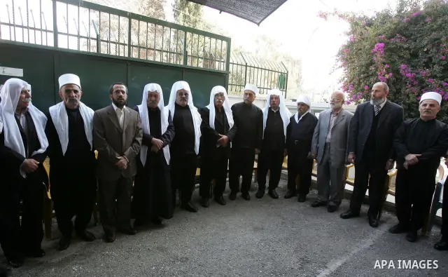 Members of the occupied Golan heights delegation visits the tent outside the Red Cross headquarters in east Jerusalem on October 28, 2011 in solidarity with Hamas legislators who took refugee inside the ICRC building in...