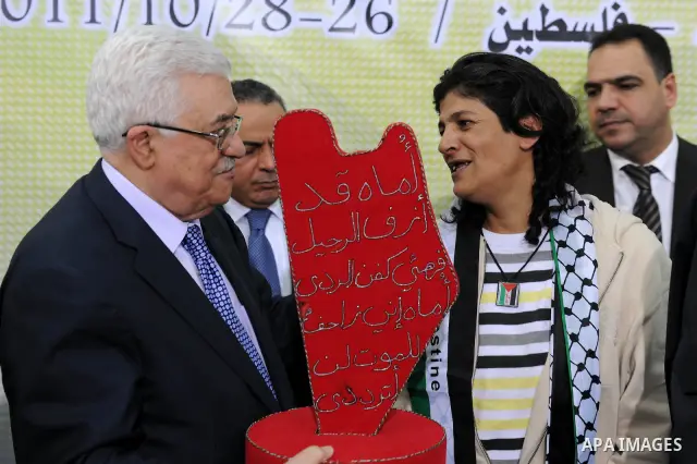 Palestinian President Mahmoud Abbas (Abu Mazen) meets with freed Palestinian prisoners in the West Bank city of Ramallah on Oct. 28, 2011. Photo by Thaer Ganaim