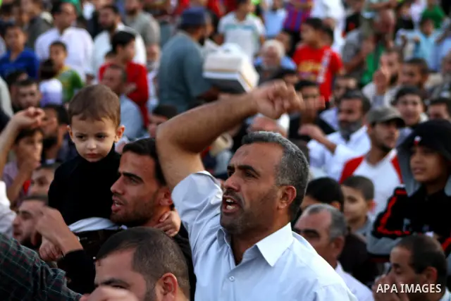 Palestinians take part in a celebration of the recent release of hundreds of Palestinians by Israel in the central Gaza Strip, Friday, Oct. 28, 2011. Hundreds of Palestinians were released in exchange for captured Israel...