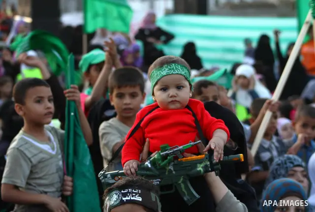 Palestinians take part in a celebration of the recent release of hundreds of Palestinians by Israel in the central Gaza Strip, Friday, Oct. 28, 2011. Hundreds of Palestinians were released in exchange for captured Israel...