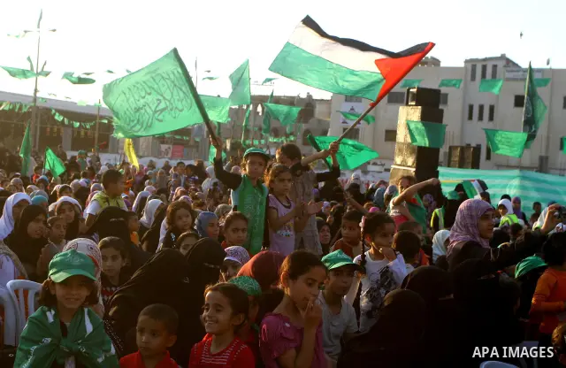 Palestinians take part in a celebration of the recent release of hundreds of Palestinians by Israel in the central Gaza Strip, Friday, Oct. 28, 2011. Hundreds of Palestinians were released in exchange for captured Israel...