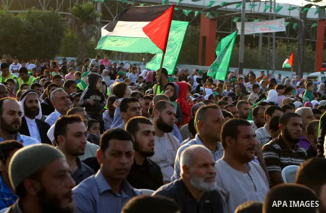 Palestinians take part in a celebration of the recent release of hundreds of Palestinians by Israel in the central Gaza Strip, Friday, Oct. 28, 2011. Hundreds of Palestinians were released in exchange for captured Israel...