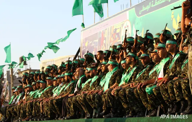 Freed Palestinian prisoners attend a celebration of the recent release of hundreds of Palestinians by Israel in the central Gaza Strip, Friday, Oct. 28, 2011. Hundreds of Palestinians were released in exchange for captur...
