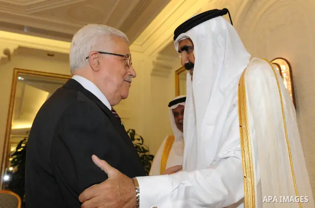 Palestinian President Mahmoud Abbas (Abu Mazen) during a meeting with the Emir of Qatar Sheikh Hamad bin Khalifa Al Thani. in Qatar on Oct. 30, 2011.Photo by Thaer Ganaim
