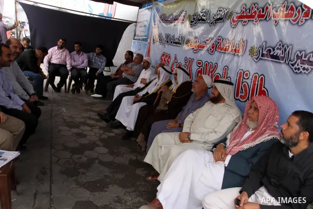 Palestinians UNRWA employees take part during Press conference for workers in front of the UNRWA. Union officials called the United Nations Relief and Works Agency (UNRWA) employees to suspend the study in all UNRWA scho...