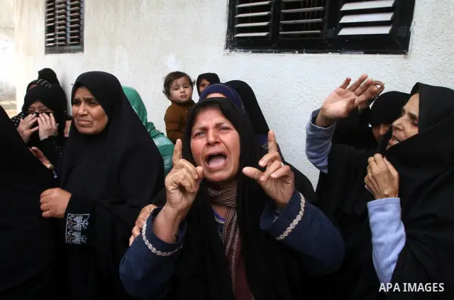 Palestinian women react during the funeral of DFLP militant Ahmed Jargon, killed in an Israeli strike on Sunday, in Rafah, southern Gaza Strip, Monday, Oct. 31, 2011. Deadly violence between Israel and Gaza militants fla...