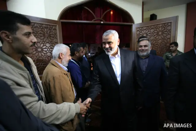 Palestinian Prime minister in Gaza Strip, Ismail Haniya attends the opening celebration of al-Borno mosque in Gaza city on Nov. 1,2011. Photo by Mahmud Nassar
