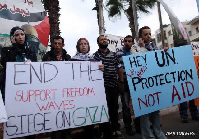 Palestinians protest against the Israeli blockade on the Gaza Strip, in the West Bank city of Ramallah Thursday, November 3, 2011. Photo by Issam Rimawi