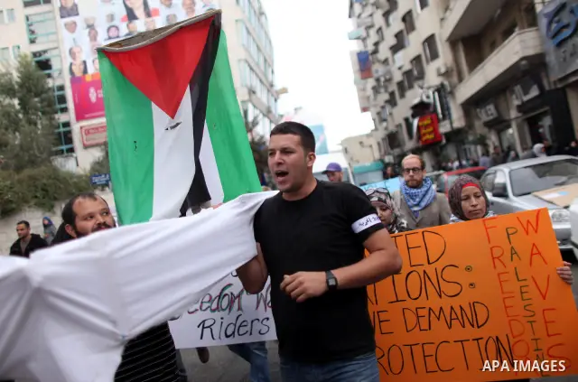 Palestinians protest against the Israeli blockade on the Gaza Strip, in the West Bank city of Ramallah Thursday, November 3, 2011. Photo by Issam Rimawi