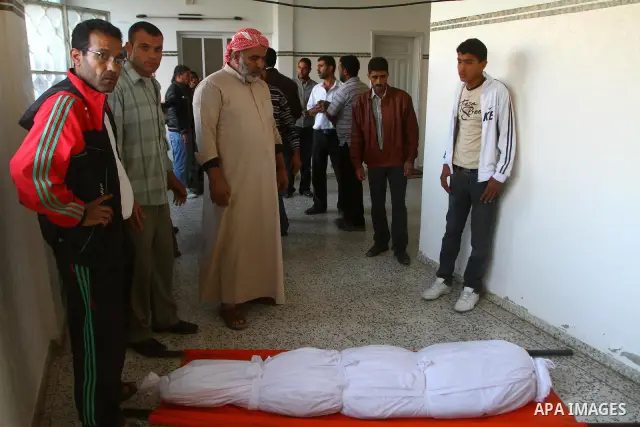 Palestinians mourn the bodies of two militants killed by Israeli troops, in the northern Gaza Strip November 3, 2011. Israeli forces killed the two Palestinian militants in a clash along the Israel-Gaza border on Thursda...