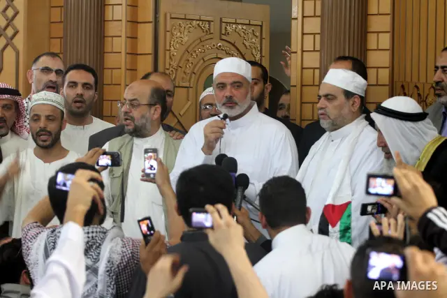 Palestinian prime minister in Gaza Strip, Ismail Haniya speaks during his meeting with members of Miles of Smiles convoy at a mosque in Gaza city on Nov. 3,2011. Photo by Mohammed Asad