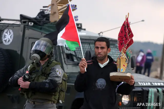 Israeli soldiers clash with Palestinian stone throwers following a weekly demonstration against Israeli settlement expansion, in the West Bank village of Nabi Saleh on November 4, 2011 in the Israeli occupied Palestinian...