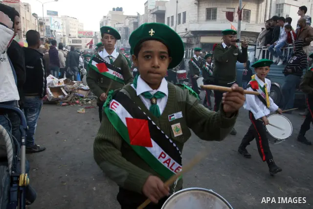 Palestinians shopping to celebrate Eid al-Adha festival in a market of Gaza City on Nov. 4, 2011. Muslims across the world are preparing to celebrate the annual festival of Eid al-Adha, or the Festival of Sacrifice. Phot...