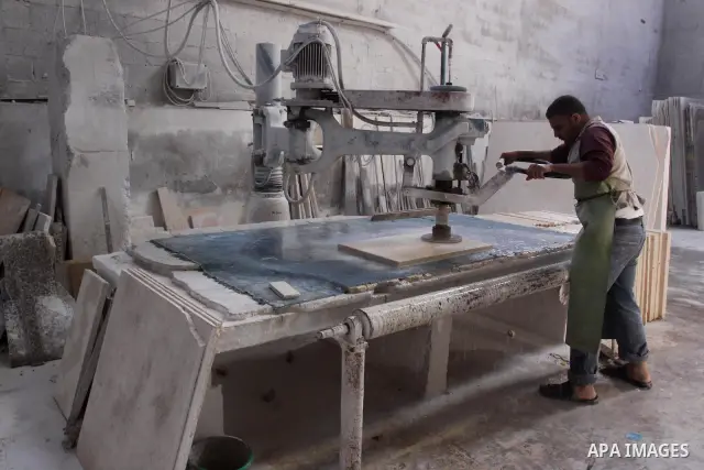 Palestinian worker prepare marble in a factory for marbles in Gaza city on Nov. 13, 2010. Palestinian suffer from decreasing in the industrial materials because of the israeli blockade on Gaza Strip. Photo by Mohammed As...