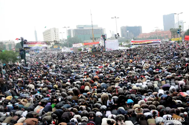 Protesters gather at Tahrir Square, the focal point of the uprising that ousted President Hosni Mubarak, in Cairo, Egypt, Friday, Nov. 18, 2011. Thousands of Egyptians are rallying in Cairo's Tahrir square, with Islamist...