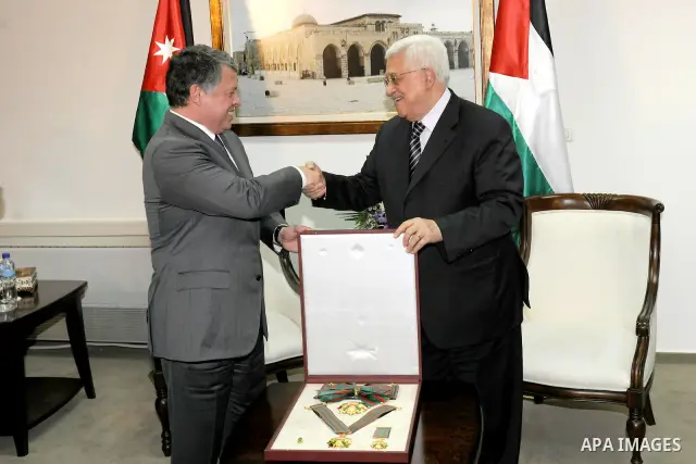 Palestinian President Mahmoud Abbas and King Abdullah of Jordan meet in the West Bank city of Ramallah November 21, 2011. Abdullah arrived in Ramallah on Monday for a rare visit to the Israeli-occupied West Bank, as the...