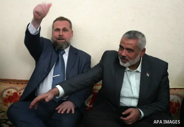 Palestinian Prime Minister in Gaza strip, Ismail Haniyeh visits the family of Ahmed al-Sheikh Khalil in the southern Gaza Strip town of Rafah on Nov. 22,2011. Ahmed al-Sheikh Khalil the commander of al-Quds Brigades the...