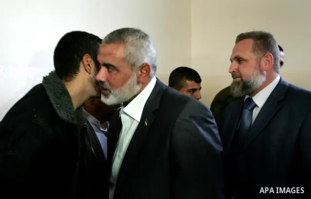 Palestinian Prime Minister in Gaza strip, Ismail Haniyeh visits the family of Ahmed al-Sheikh Khalil in the southern Gaza Strip town of Rafah on Nov. 22,2011. Ahmed al-Sheikh Khalil the commander of al-Quds Brigades the...