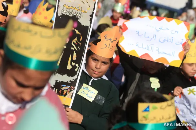 Palestinian children take part in a celebration to mark the International Children Day in Gaza city on Nov. 22,2011. Photo by Majdi Fathi