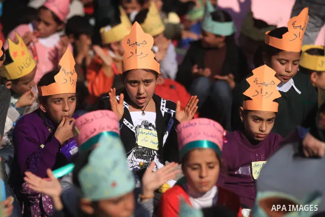 Palestinian children take part in a celebration to mark the International Children Day in Gaza city on Nov. 22,2011. Photo by Majdi Fathi