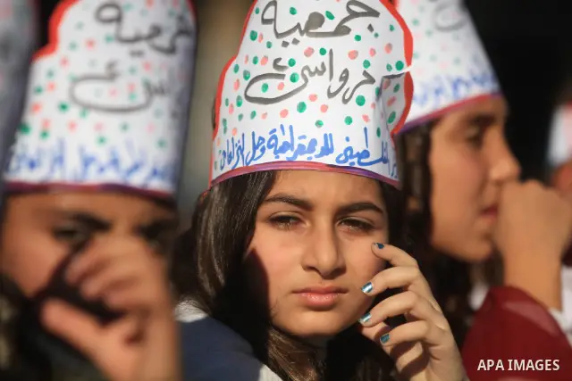 Palestinian children take part in a celebration to mark the International Children Day in Gaza city on Nov. 22,2011. Photo by Majdi Fathi