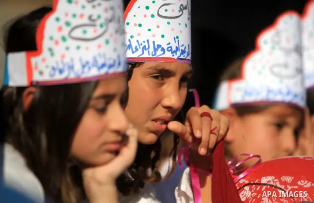 Palestinian children take part in a celebration to mark the International Children Day in Gaza city on Nov. 22,2011. Photo by Majdi Fathi