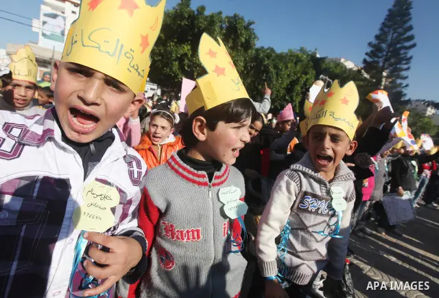 Palestinian children take part in a celebration to mark the International Children Day in Gaza city on Nov. 22,2011. Photo by Majdi Fathi