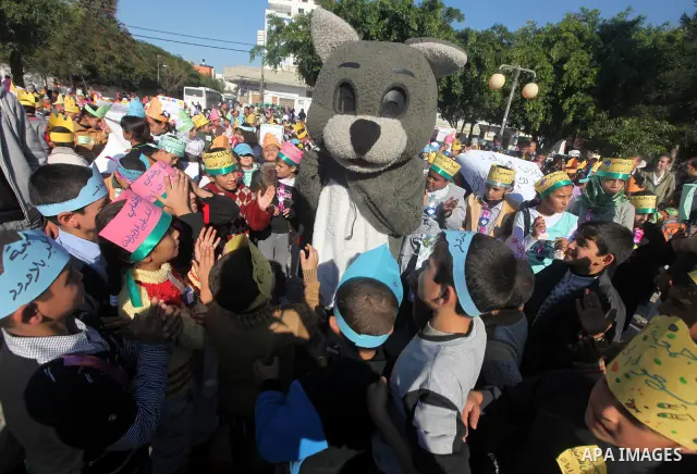 Palestinian children take part in a celebration to mark the International Children Day in Gaza city on Nov. 22,2011. Photo by Majdi Fathi