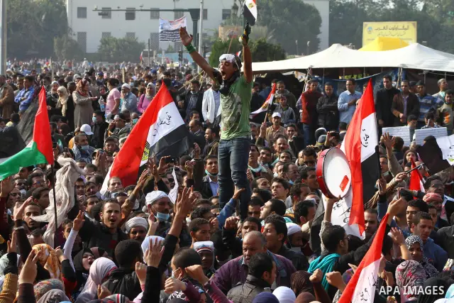 Thousands of Egyptian protesters attend a rally in Tahrir Square on the fourth day of clashes between protesters and riot police in the capital Cairo, on November 22, 2011, as they demand an end to military rule, heighte...