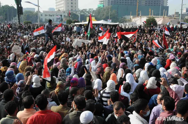 Thousands of Egyptian protesters attend a rally in Tahrir Square on the fourth day of clashes between protesters and riot police in the capital Cairo, on November 22, 2011, as they demand an end to military rule, heighte...