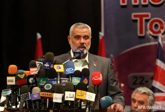 Palestinian prime minister in Gaza Strip, Ismail Haniya attends a celebration with members of the spring of freedom convoy in Gaza city on Nov. 22,2011. . Photo by Mohammed Asad