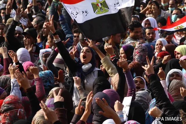 Thousands of Egyptian protesters attend a rally in Tahrir Square on the fourth day of clashes between protesters and riot police in the capital Cairo, on November 22, 2011, as they demand an end to military rule, heighte...