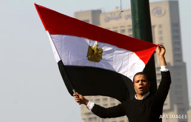 Thousands of Egyptian protesters attend a rally in Tahrir Square on the fourth day of clashes between protesters and riot police in the capital Cairo, on November 22, 2011, as they demand an end to military rule, heighte...