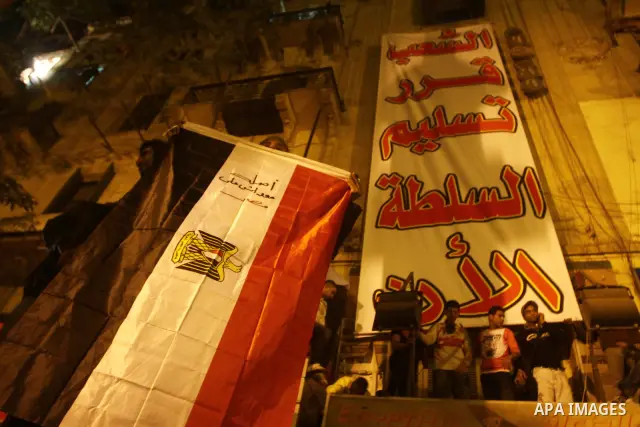 Protesters chant anti-military council slogans at Tahrir Square in Cairo November 22, 2011. Egypt's ruling generals offered on Tuesday to transfer power to a civilian president by July in a dramatic attempt to placate pr...