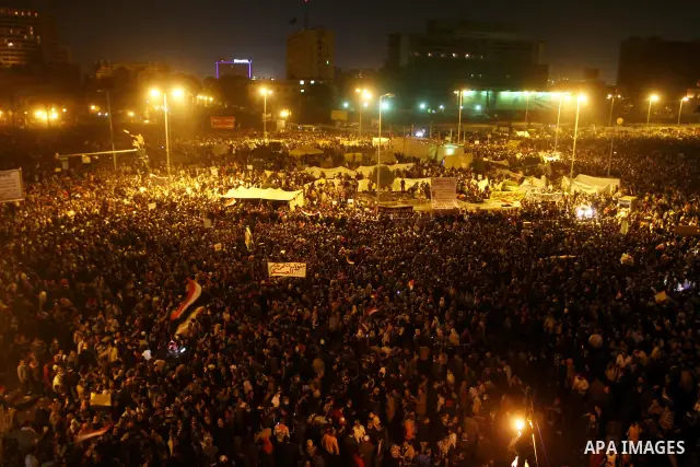 Protesters chant anti-military council slogans at Tahrir Square in Cairo November 22, 2011. Egypt's ruling generals offered on Tuesday to transfer power to a civilian president by July in a dramatic attempt to placate pr...