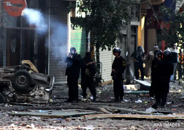 Egyptian riot police clash with protestors near Tahrir square in Cairo, Egypt, Wednesday, Nov. 23, 2011. Egyptian police are clashing with anti-government protesters for a fifth day in Cairo. Tens of thousands of protest...