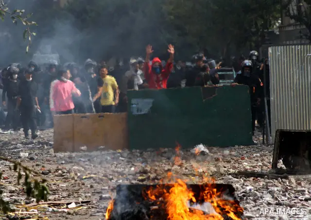Egyptian riot police clash with protestors near Tahrir square in Cairo, Egypt, Wednesday, Nov. 23, 2011. Egyptian police are clashing with anti-government protesters for a fifth day in Cairo. Tens of thousands of protest...