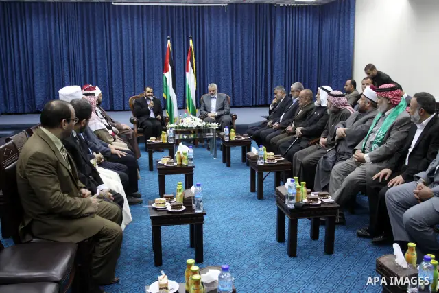 Palestinian Prime Minister in Gaza Strip, Ismail Haniyeh, receives the delegation of Sunna scholars Egyptian in Gaza City on Nov. 24, 2011. Photo by Mohammed Asad