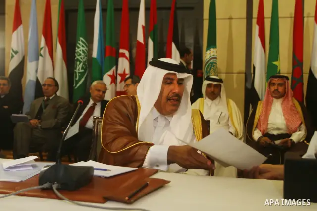 Qatar's Prime Minister and Foreign Minister Sheikh Hamad bin Jassim al-Thani attends a ministerial meeting at the Arab League headquarters on Syria in Cairo on November 24, 2011. Arab foreign ministers have invited Syria...